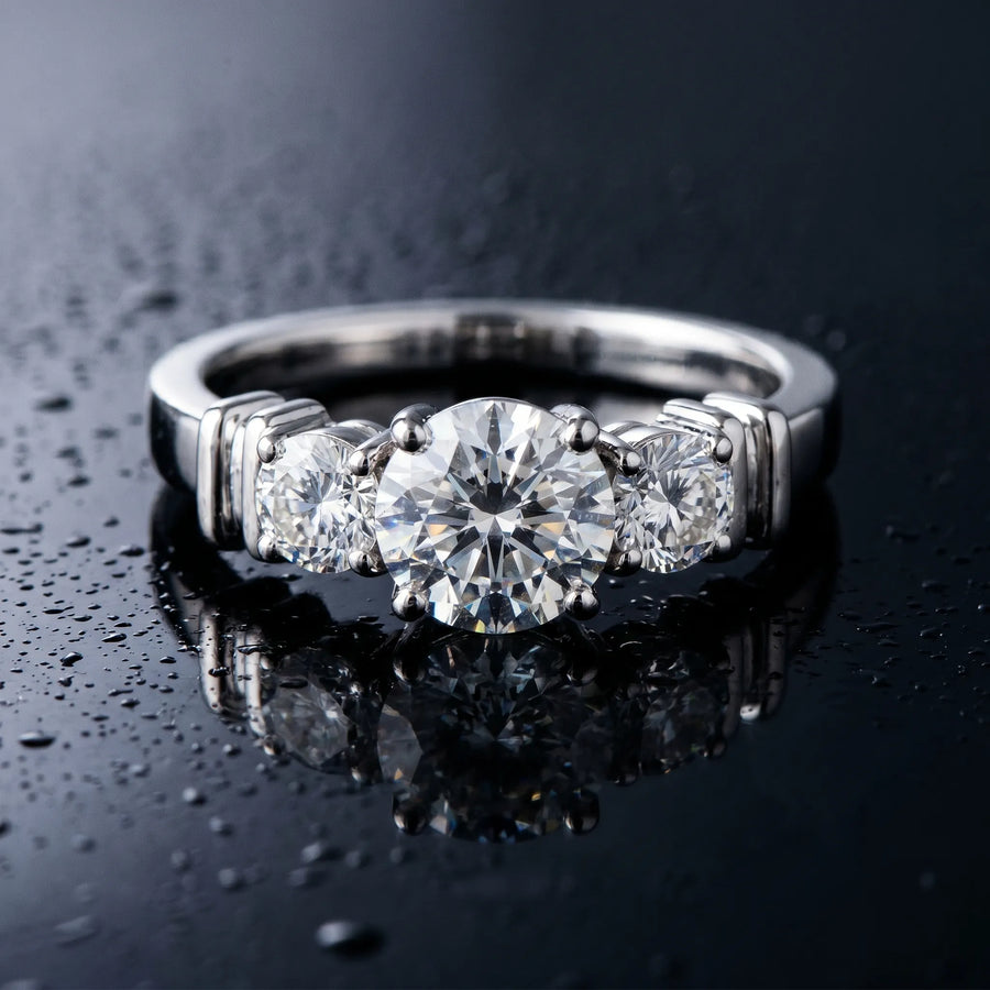 White gold Three-Stone Round Diamond Solitaire Ring with Channel Band and Prong Setting