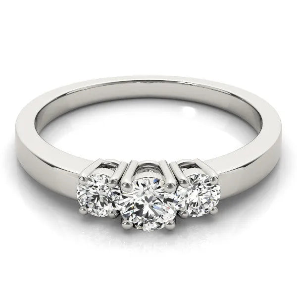 White gold Three-Stone Round Diamond Solitaire Ring with Channel Set Band and Four-Prong Setting