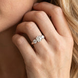 White gold Three-Stone Round Diamond Solitaire Ring with Channel Set Band and Four-Prong Setting_30