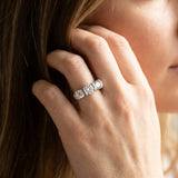 Platinum Three-Stone 6.14 Carat D VVS1 Round Diamond Trellis Engagement Ring with Channel-Set Band