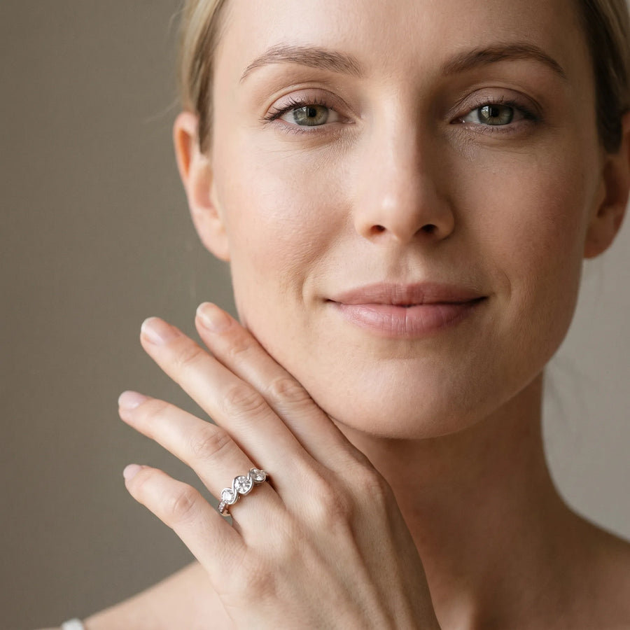 White gold Three-Stone Round Diamond Twist Band with Channel Setting