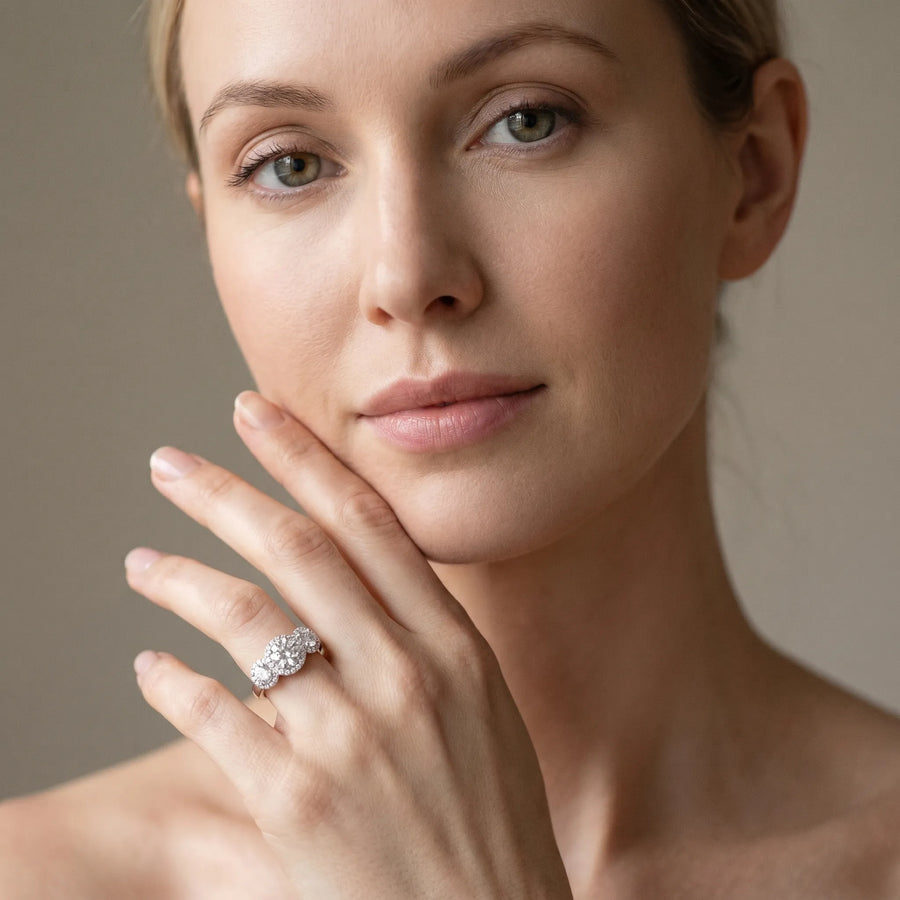 White gold Three-Stone Round Halo Diamond Ring with Pavé Band and Prong Setting