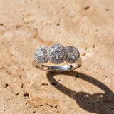 White gold Three-Stone Round Halo Diamond Ring with Pavé Band and Prong Setting_30