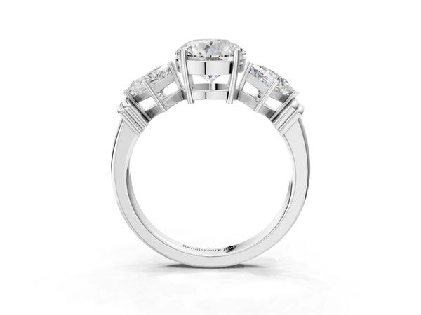 White gold Three-Stone Round and Princess Cut Diamond Ring with Channel Band and Four-Prong Setting