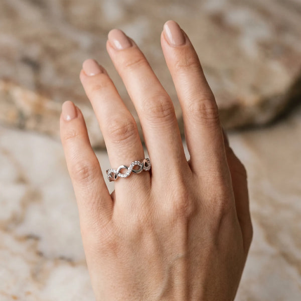 White gold Twist Infinity Round Diamond Band with Pavé Setting