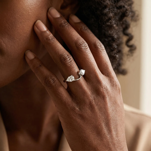 White gold Two-Stone Pear Diamond Bypass Ring with Prong Setting