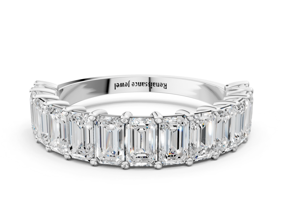 White gold emerald cut diamond half eternity band with shared prong setting_17