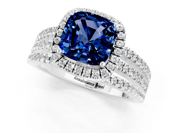 Platinum Cushion Cut Blue Sapphire Halo Engagement Ring with Split Shank and Four-Prong Setting