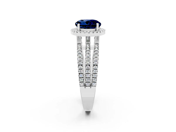 Platinum Round Cut Blue Sapphire Halo Engagement Ring with Split Shank and Four-Prong Setting