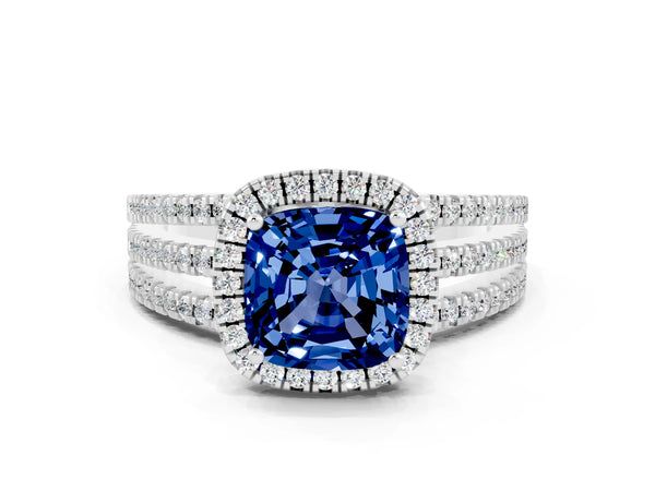 Platinum Cushion Cut Blue Sapphire Halo Engagement Ring with Split Shank and Four-Prong Setting