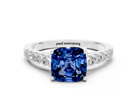 White gold {shape_name} Blue Sapphire Solitaire Ring with Pavé Band and Four-Prong Setting