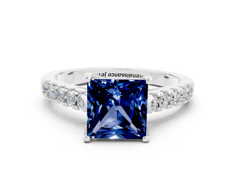 White gold {shape_name} Blue Sapphire Solitaire Ring with Pavé Band and Four-Prong Setting