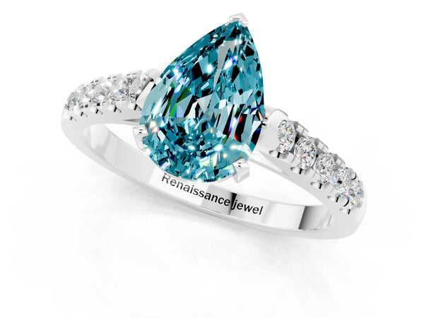 White gold Pear Cut Blue Topaz Pavé Band Solitaire Ring with Prong Setting