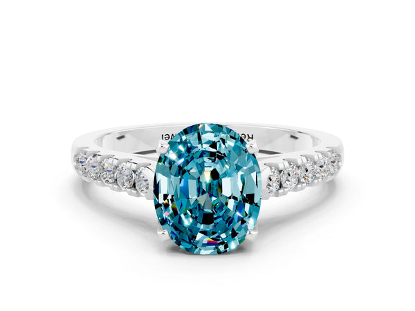 Silver Oval Cut Blue Topaz Pavé Band Solitaire Ring with Prong Setting