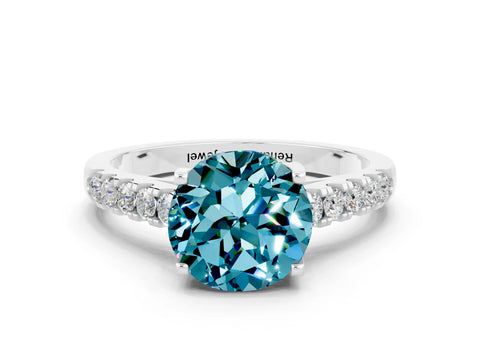 White gold {shape_name} Blue Topaz Solitaire Ring with Pavé Band and Four-Prong Setting