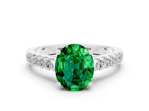 White gold {shape_name} Emerald Solitaire Ring with Pavé Band and Four-Prong Setting