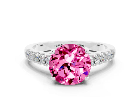 White gold {shape_name} Pink Sapphire Solitaire Ring with Pavé Band and Four-Prong Setting
