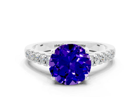 White gold {shape_name} Tanzanite Solitaire Ring with Pavé Band and Four-Prong Setting