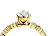 Yellow gold 0.5 Carat Pear Cut  Solitaire with Side Stones on a Pavé Band and Four-Prong Setting_16