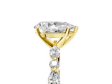 Yellow gold 0.5 Carat Pear Cut  Solitaire with Side Stones on a Pavé Band and Four-Prong Setting_24