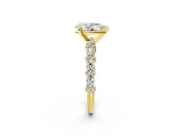 1 Carat Pear Cut Yellow gold Diamond Side Stone Solitaire Ring with Round and Four-Prong Setting