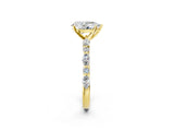 Yellow gold 7 Carat Pear Cut  Solitaire with Side Stones on a Pavé Band and Four-Prong Setting_24