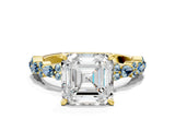 Yellow gold Asscher Cut Diamond Side Stone Solitaire Ring with Round with Aquamarine side stone and Four-Prong Setting