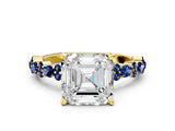 Yellow gold Asscher Cut Diamond Side Stone Solitaire Ring with Round with Blue Sapphire side stone and Four-Prong Setting