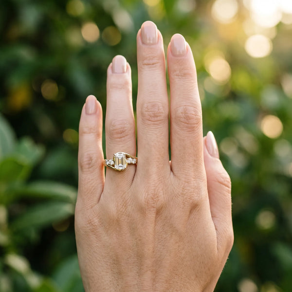 Yellow gold Bezel Set Emerald Diamond Split Shank Ring