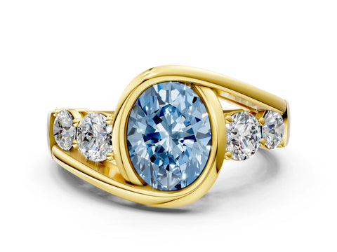 Yellow gold Bezel Set Fancy Blue Oval Cut Diamond Split Shank Ring