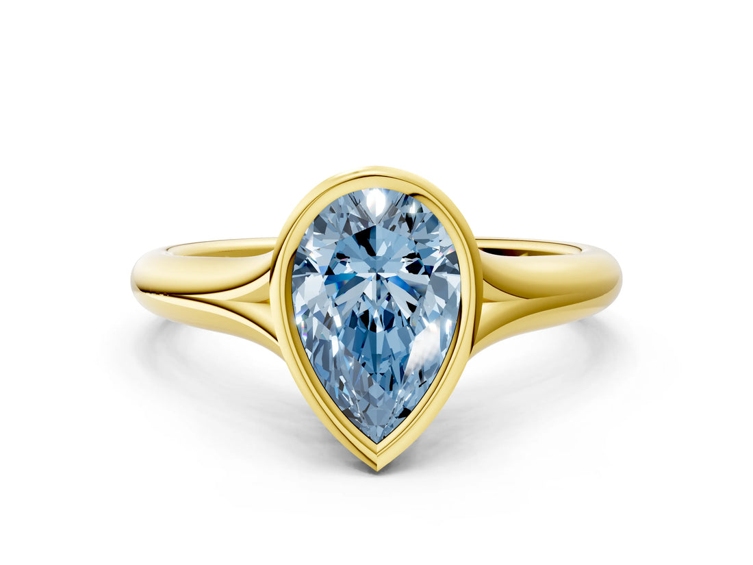 Yellow gold Bezel Set Fancy Blue Pear  Solitaire Diamond Ring with Smooth Band