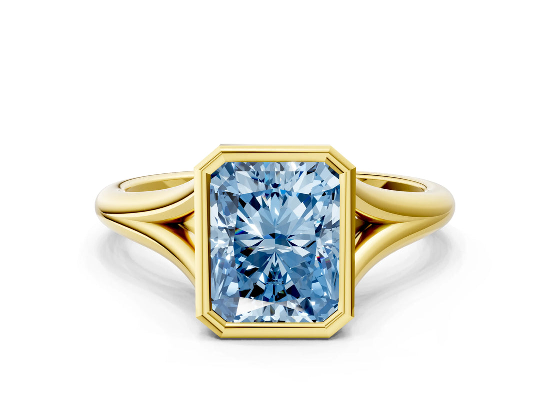 Yellow gold Bezel Set Fancy Blue Radiant  Cut Solitaire Ring with Tapered Band
