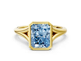 Yellow gold Bezel Set Fancy Blue Radiant  Cut Solitaire Ring with Tapered Band