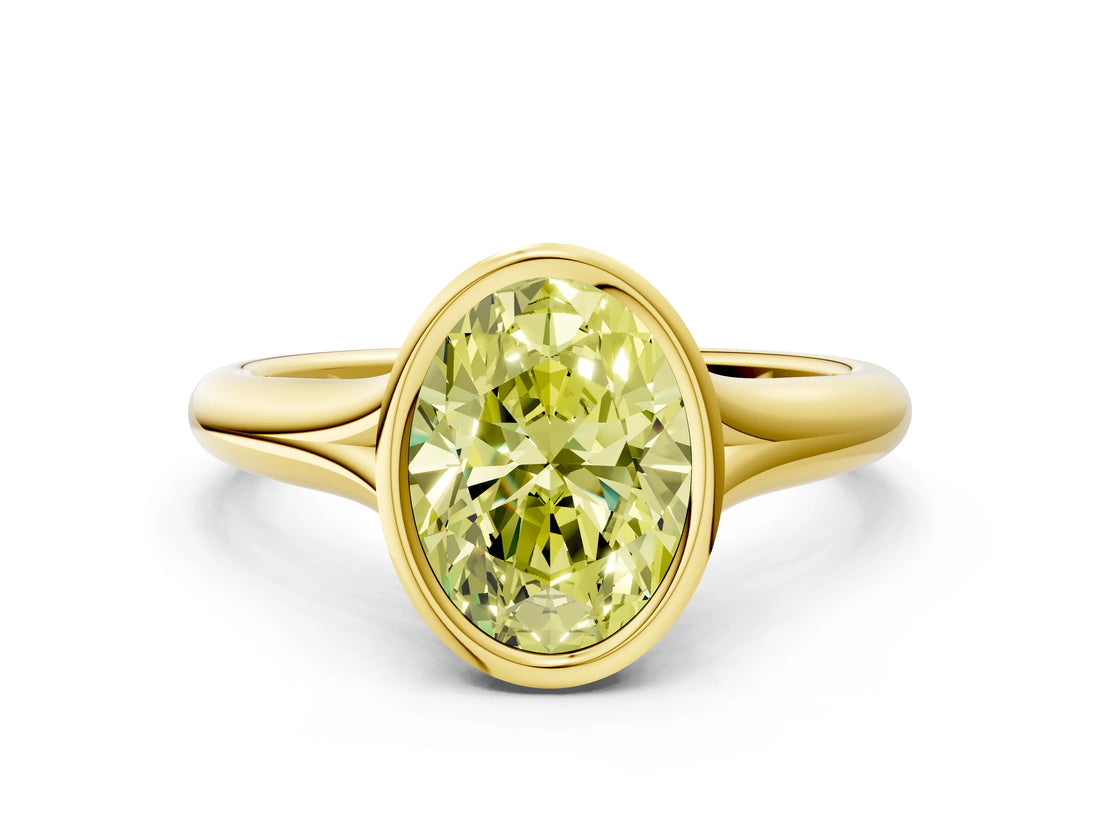 Yellow gold Bezel Set Fancy Yellow Oval  Solitaire Diamond Ring with Smooth Band