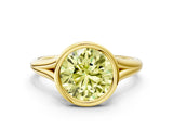 Yellow gold Bezel Set Fancy Yellow Round  Cut Solitaire Ring with Tapered Band