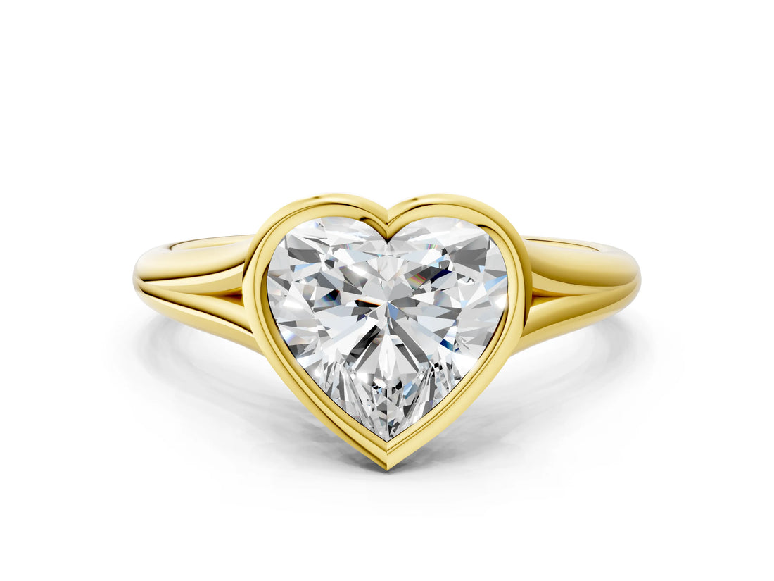 Yellow gold Bezel Set Heart Cut Solitaire Ring with Tapered Band