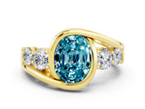 Yellow gold Bezel Set Oval Cut Diamond Split Shank Ring