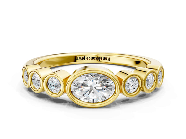 Yellow gold Bezel Set Oval Diamond Half Eternity Band