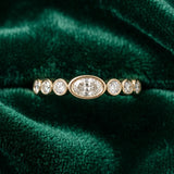 Yellow gold Bezel Set Oval Diamond Half Eternity Band