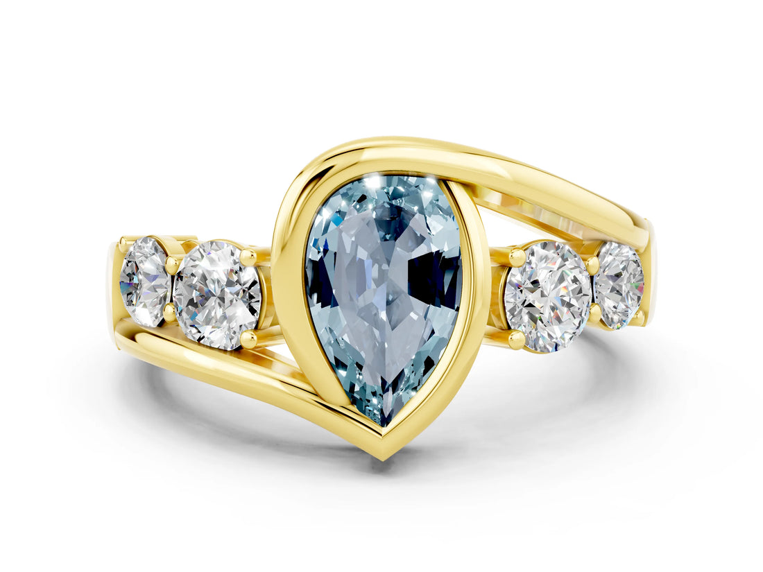 Yellow gold Bezel Set Pear Cut Diamond Split Shank Ring
