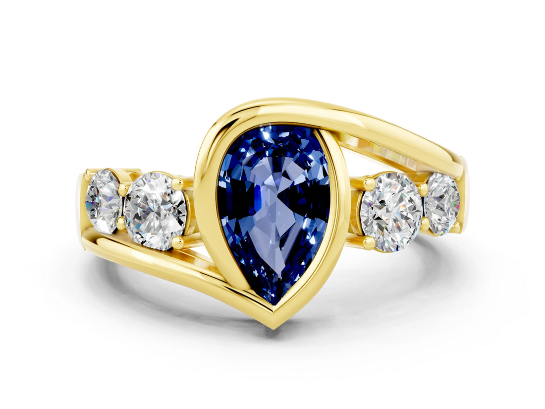 Yellow gold Bezel Set Pear Cut Diamond Split Shank Ring