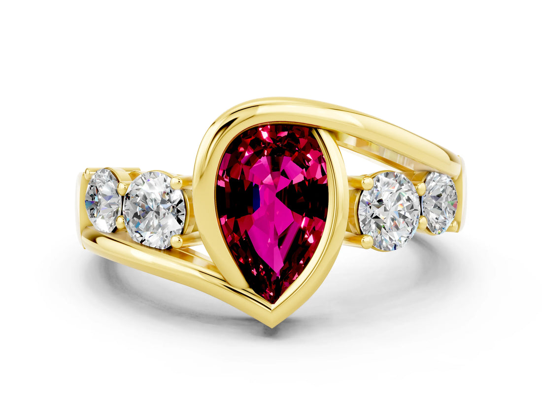 Yellow gold Bezel Set Pear Cut Diamond Split Shank Ring