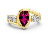 Yellow gold Bezel Set Pear Cut Diamond Split Shank Ring
