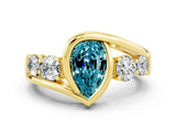 Yellow gold Bezel Set Pear Cut Diamond Split Shank Ring