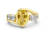Yellow gold Bezel Set Pear Cut Diamond Split Shank Ring