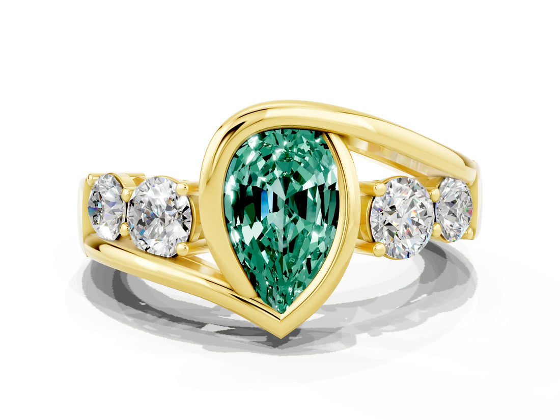 Yellow gold Bezel Set Pear Cut Diamond Split Shank Ring
