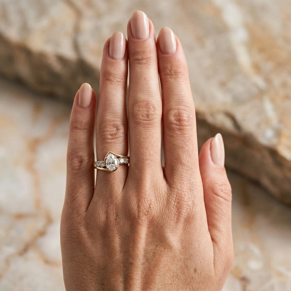Yellow gold Bezel Set Pear Diamond Split Shank Ring