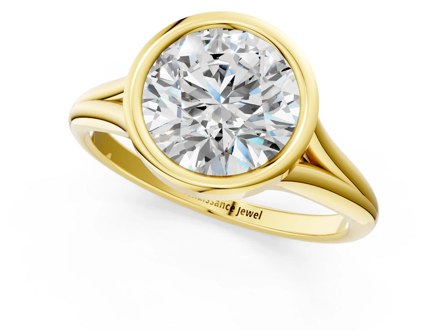 Yellow gold Bezel Set Round Cut Solitaire Ring with Tapered Band