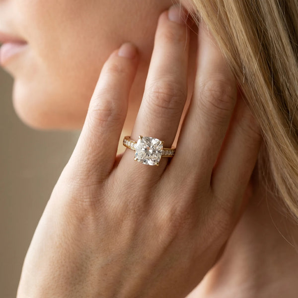 Yellow gold Cushion Brilliant Cut Diamond Engagement Ring with Pavé Band and Four-Prong Setting