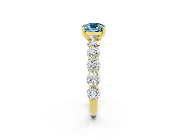 Yellow gold Cushion Cut Aquamarine Prong Setting with Side Stones on a Pave Band